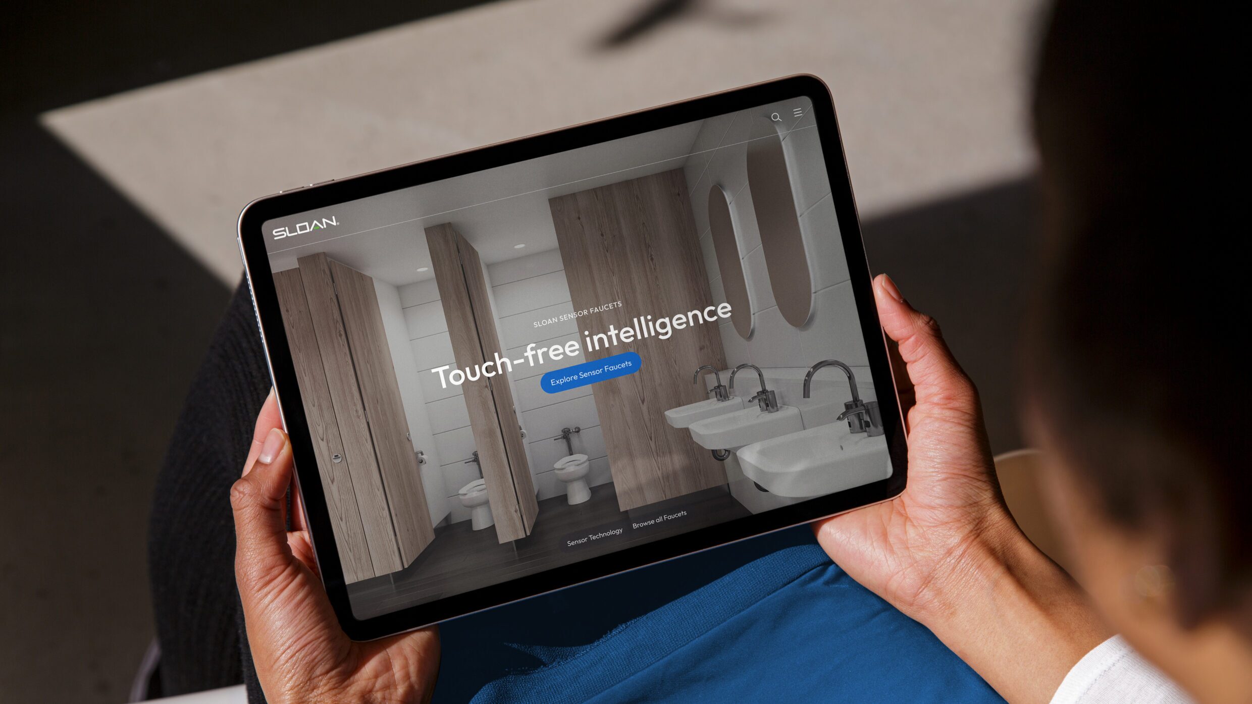 Tablet interface displaying Sloan homepage